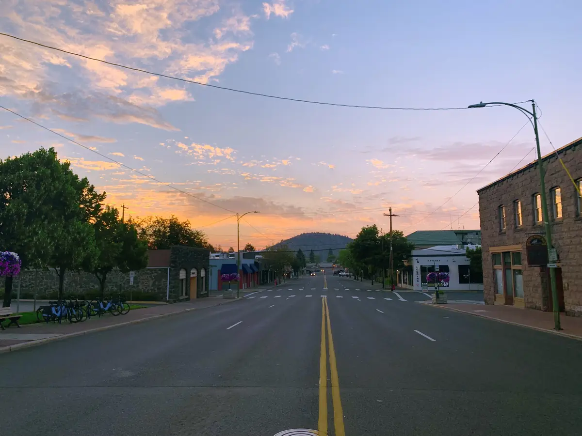 Downtown Bend, Oregon street at sunset, where you can contact Thorn Property Management