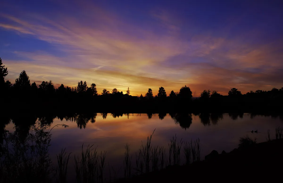 Sunset over a pond at Eagle Crest Resort in Redmond, Oregon