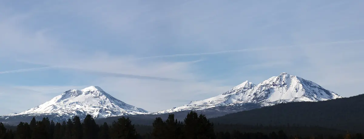 Three Sisters peaks over the high desert west of Tumalo, the backdrop for Tumalo property management